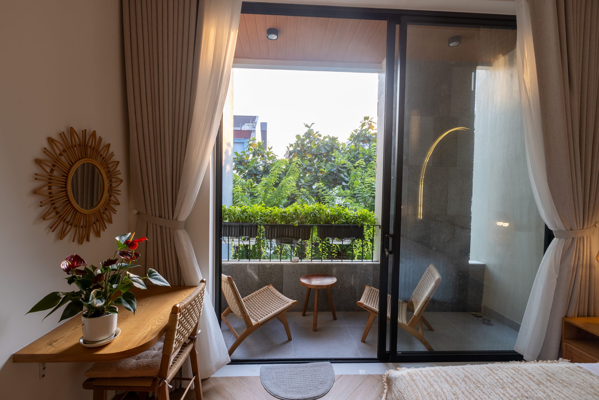 Bedroom with balcony view