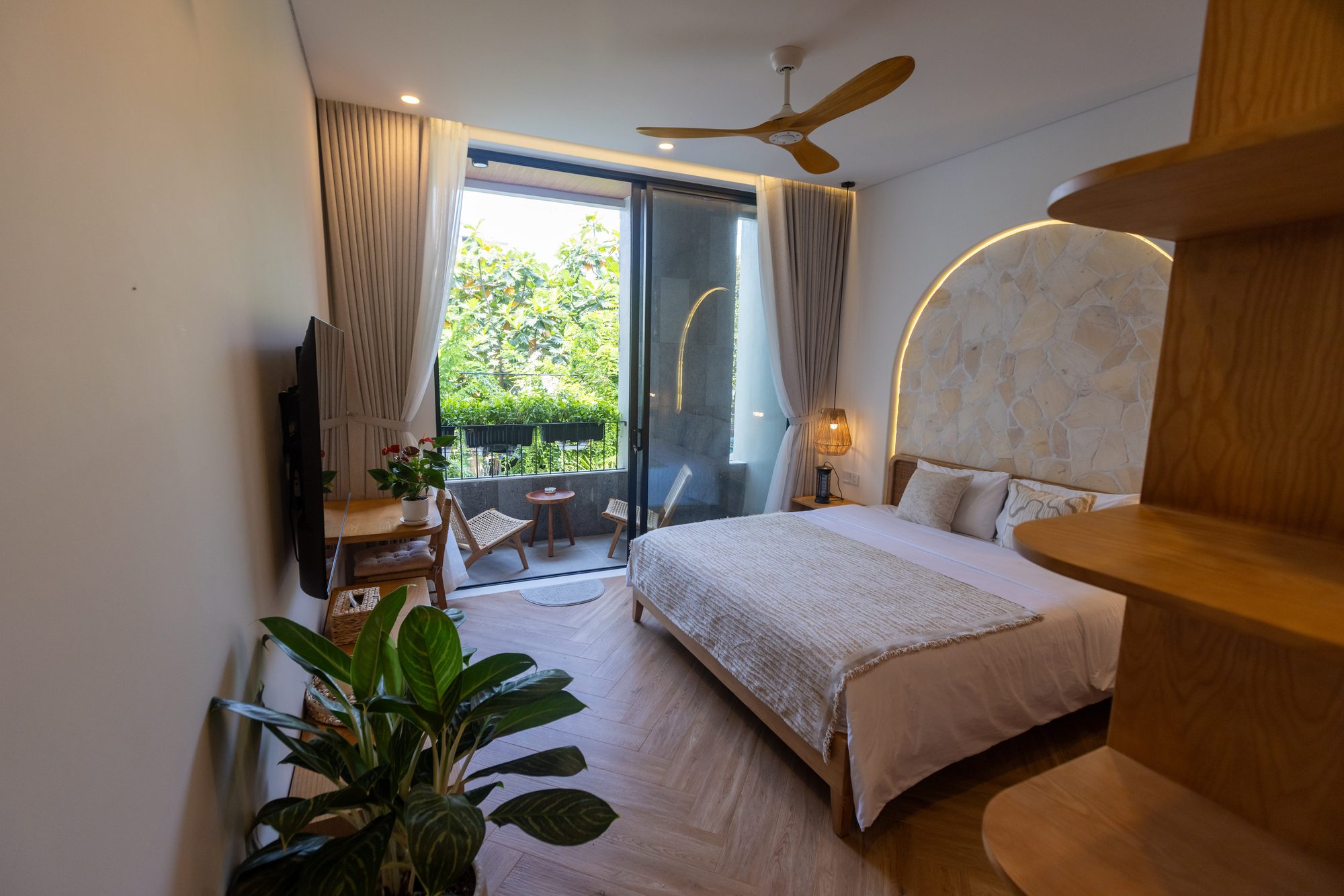 Bedroom with balcony green view