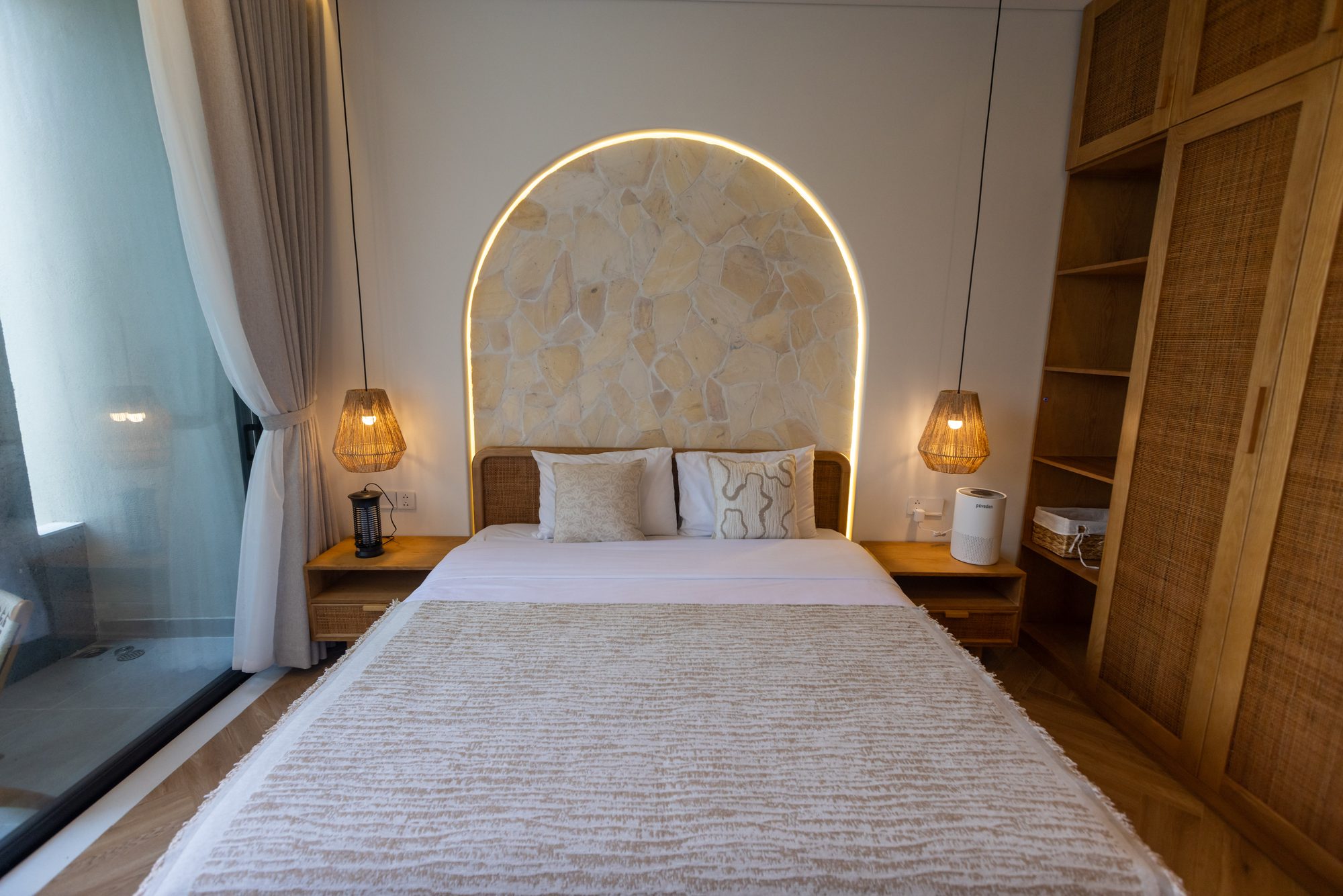Bedroom with stone arch