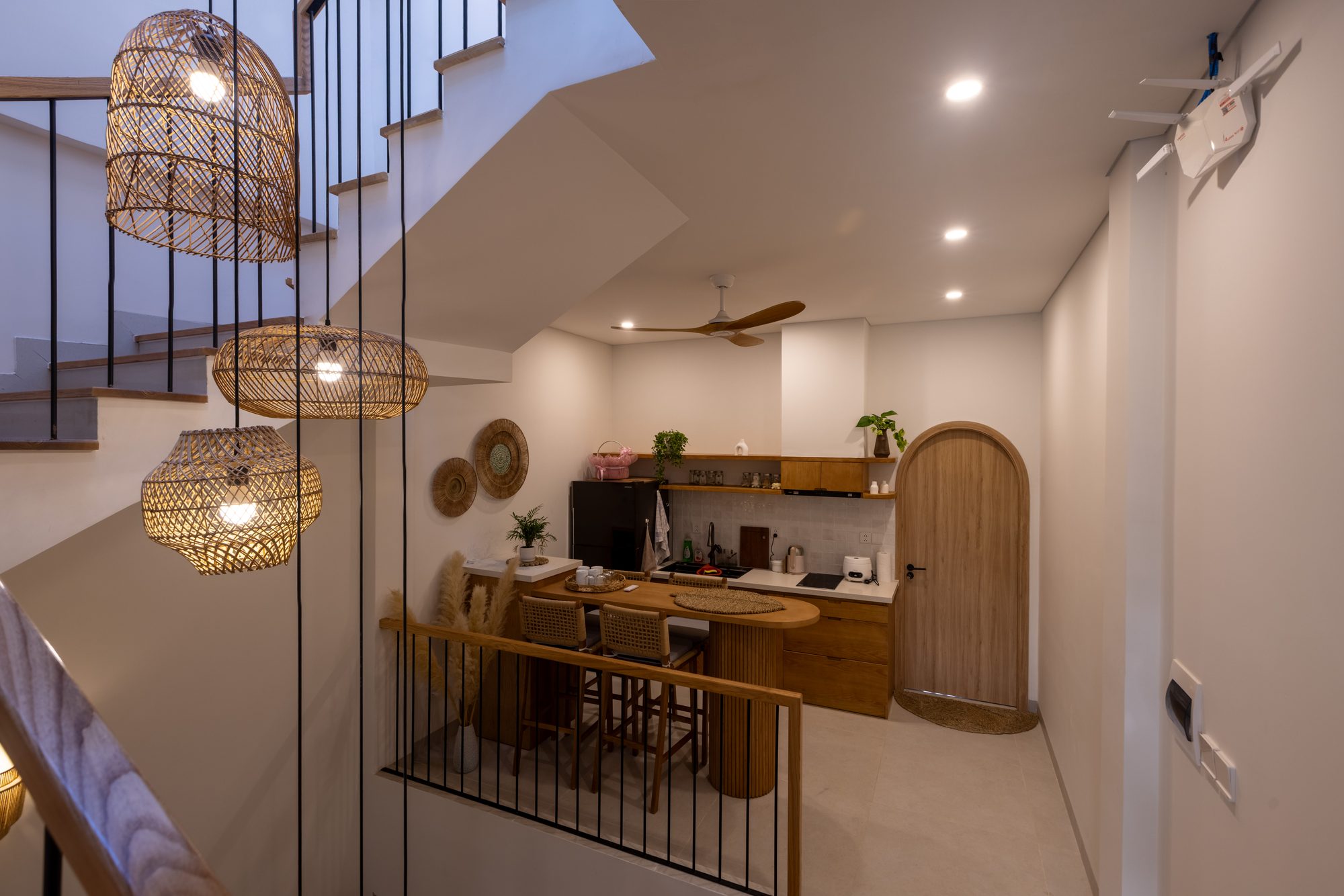 Kitchen view with rattan pendants